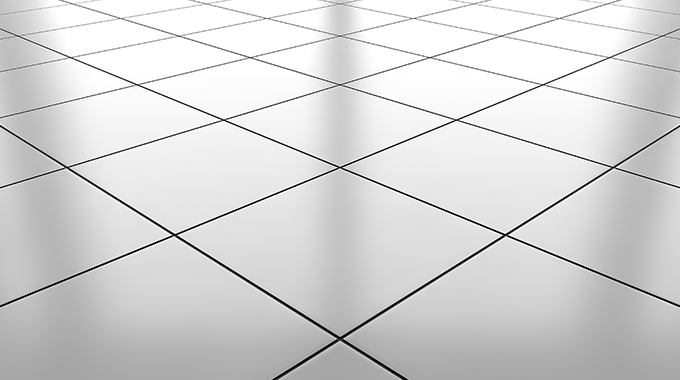 a floor of white tiles with black lines separating them